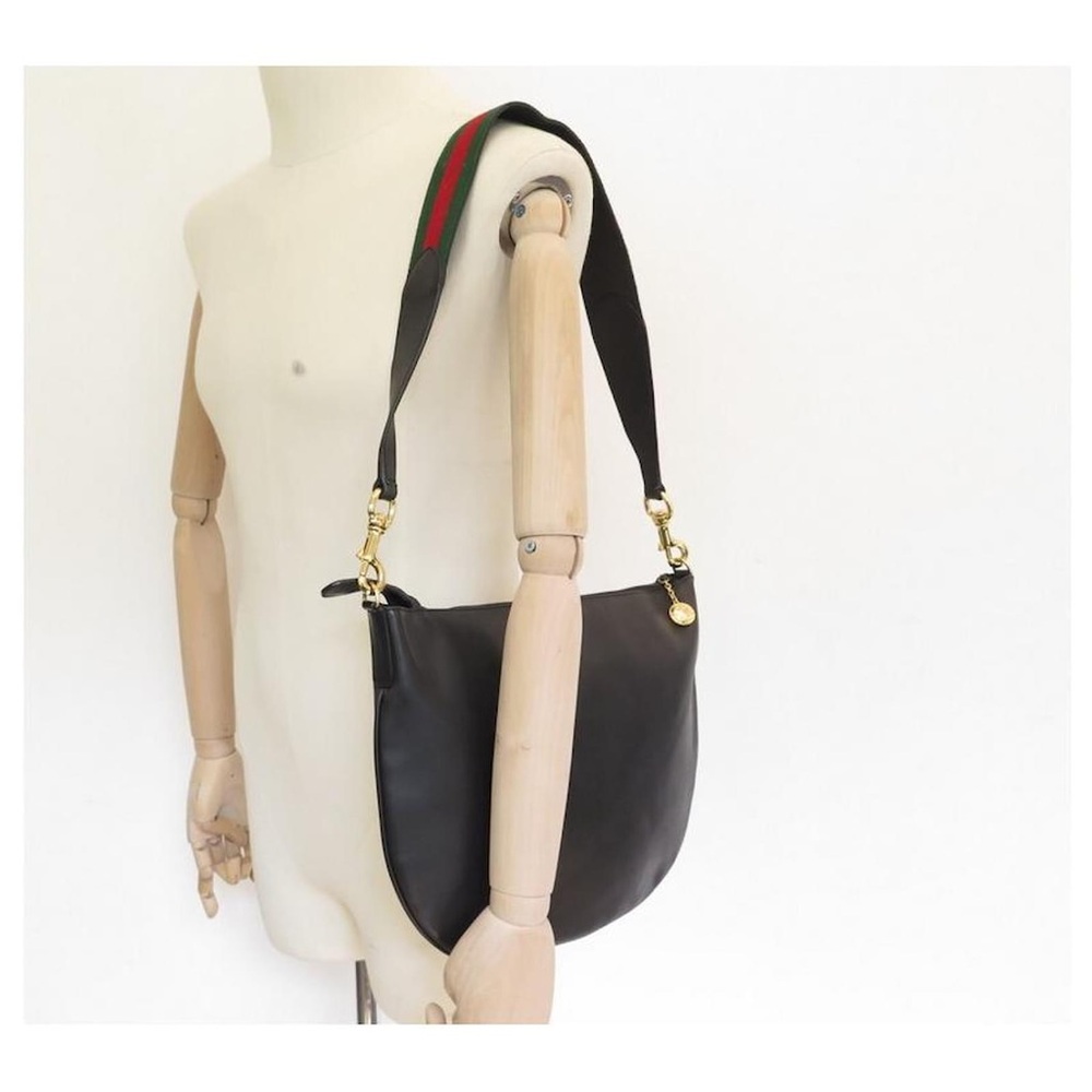 VINTAGE GUCCI HOBO HANDBAG IN BLACK LEATHER HANDLE BAND WEB
LEATHER HAND BAG